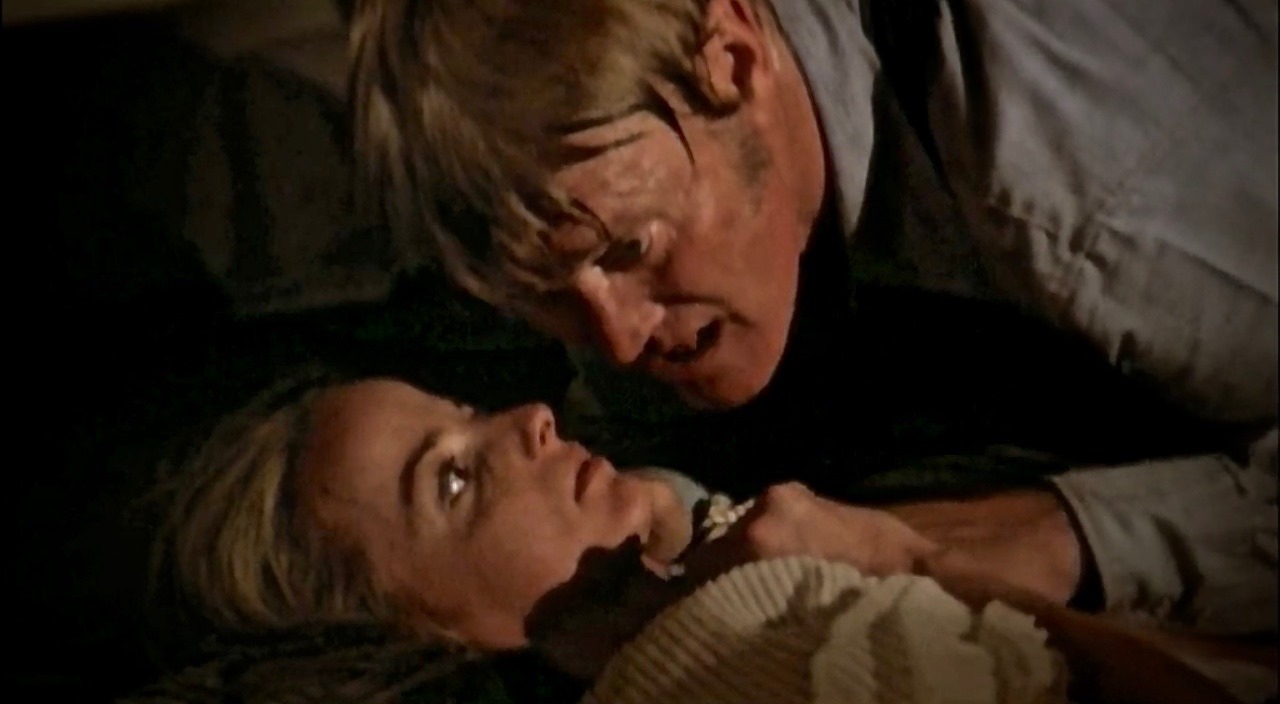 Backwoods psycho Chuck Connors with an imprisoned Jocelyn Jones in Tourist Trap (1979)