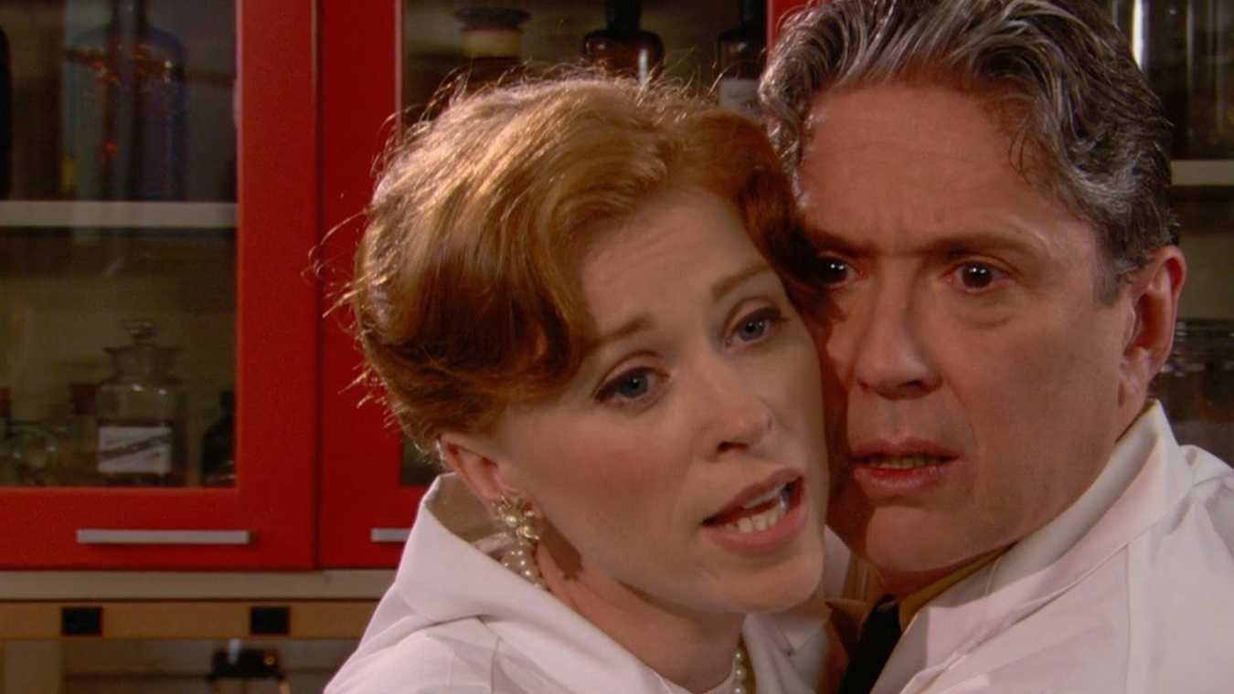 Dr Sheila Bexter (Fay Masterson) and colleague Dr Philip Latham (Andrew Parks) in Trail of the Screaming Forehead (2007)