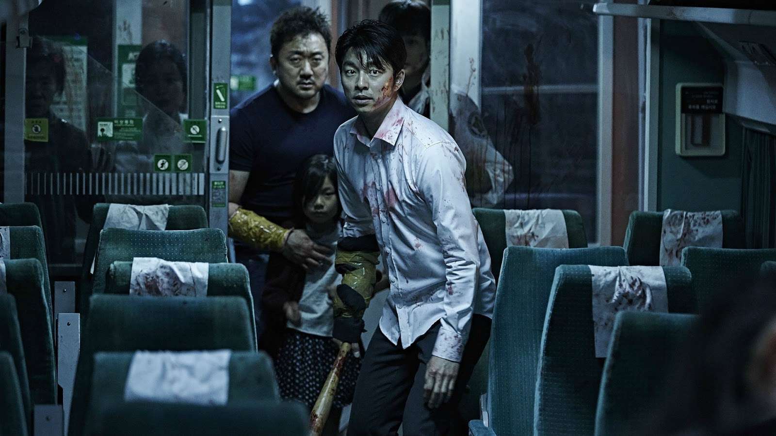 (front to back) father Yoo Gong, daughter Soo-an Kim and Dong-seok Ma venture forward to tackle the zombies in Train to Busan (2016)