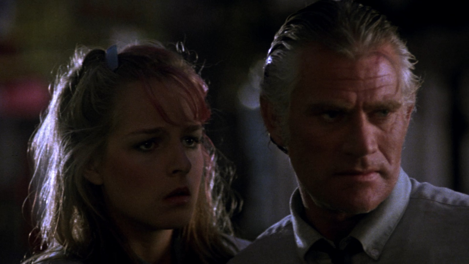 Tim Thomerson as Jack Deth and a young Helen Hunt in Trancers (1985)