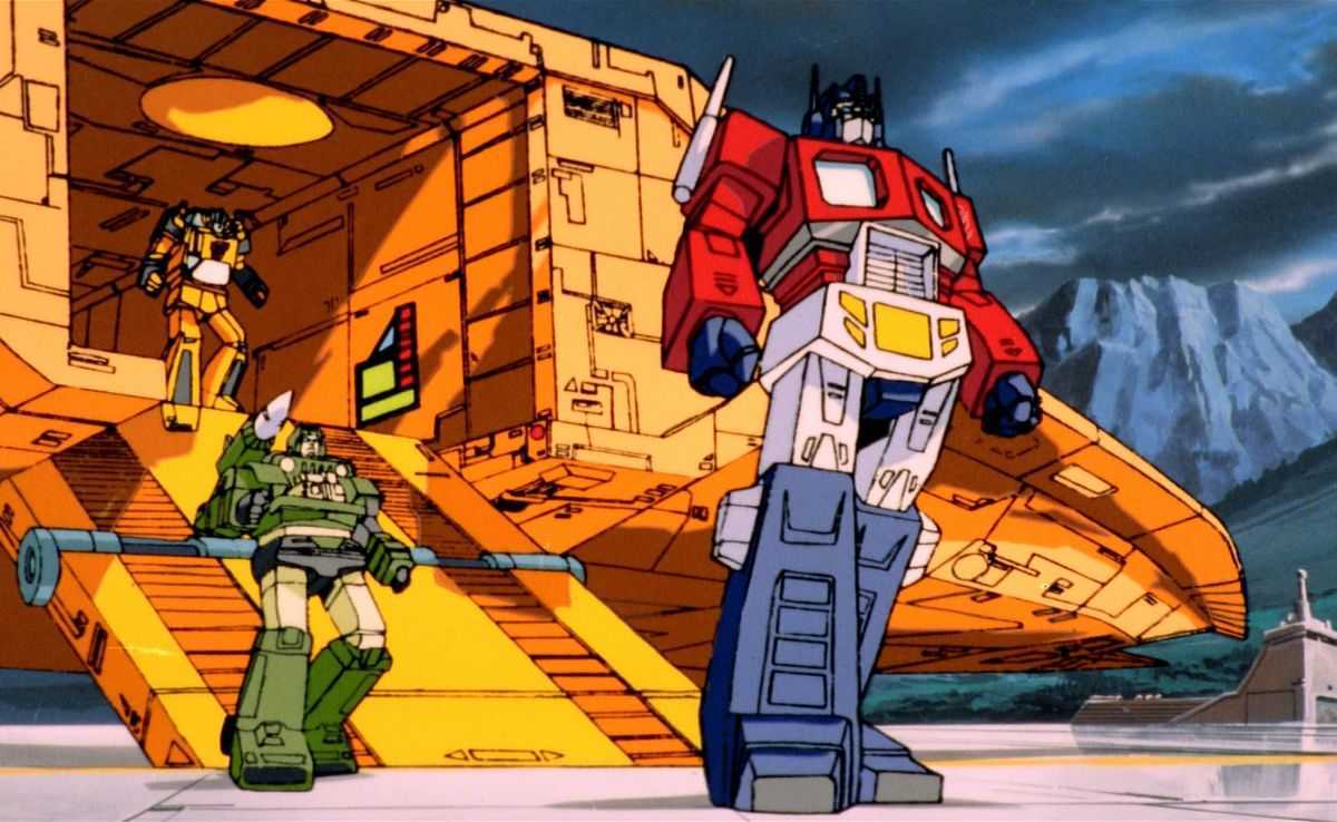 Optimus Prime (r) leads the Autobots into action in The Transformers: The Movie (1986)