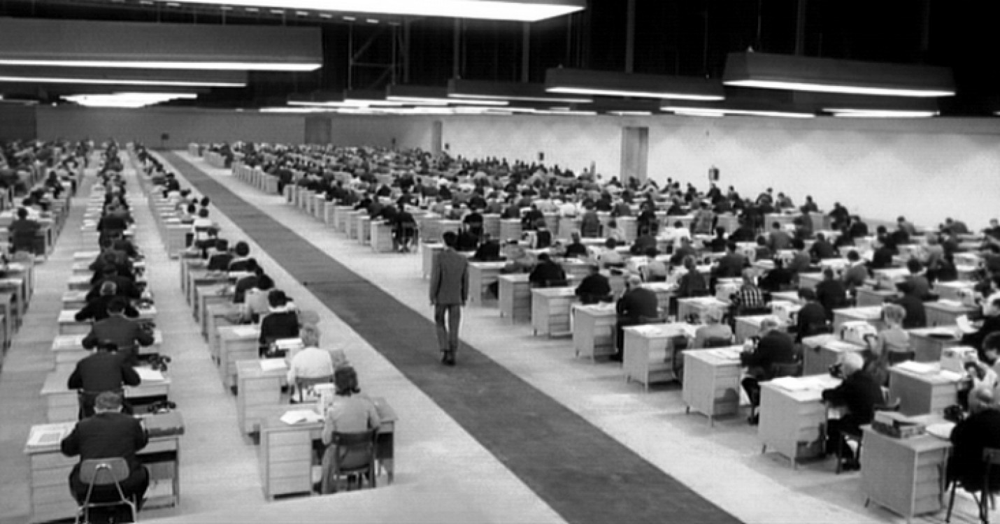 Orson Welles' use of architectural space - Anthony Perkins passes through an office filled with hundreds of secretaries in The Trial (1962)