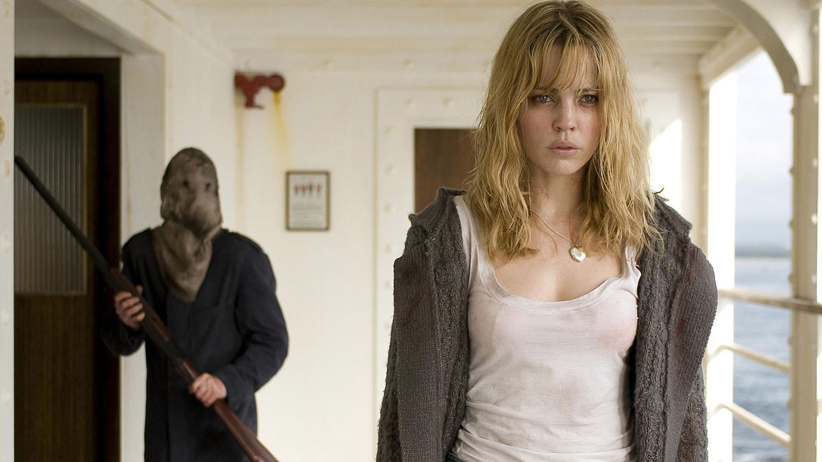 Melissa George and the masked figure in Triangle (2009)