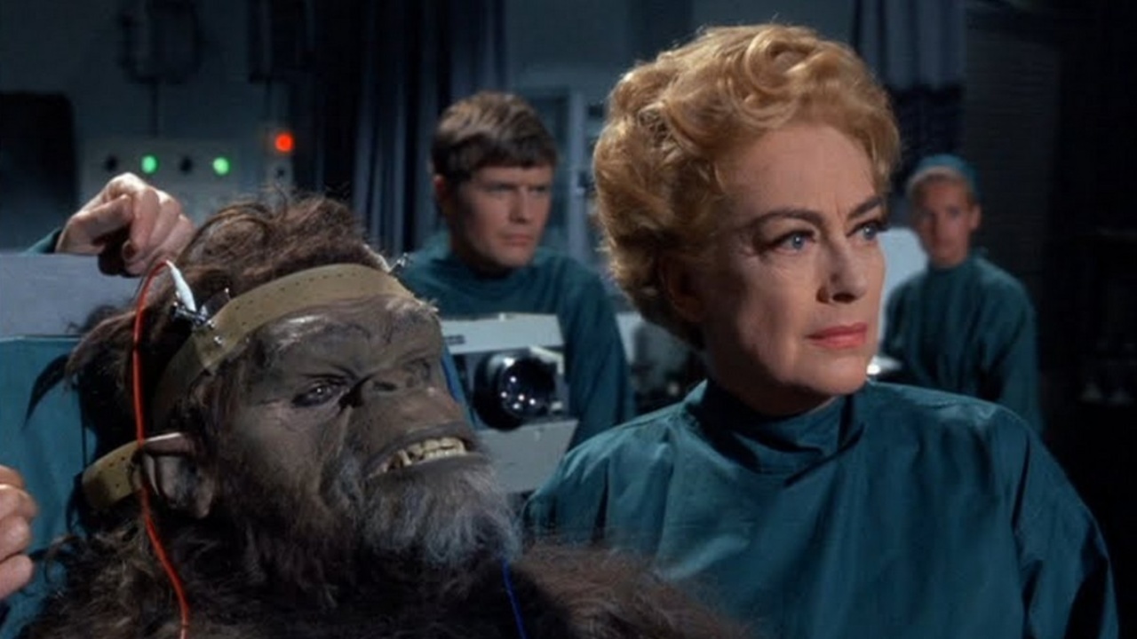 Joan Crawford and the Trog (Joe Cornelius) in Trog (1970)