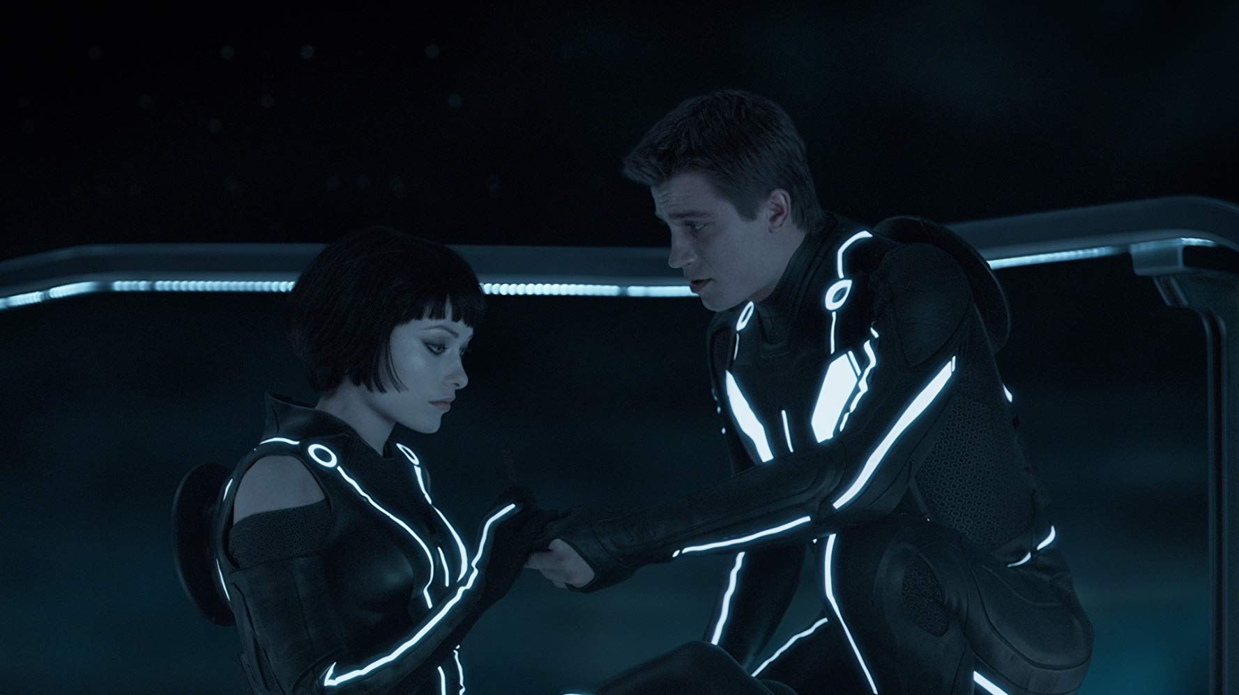 Quora (Olivia Wilde) and Garrett Hedlund as Flynn's son in Tron Legacy (2010)