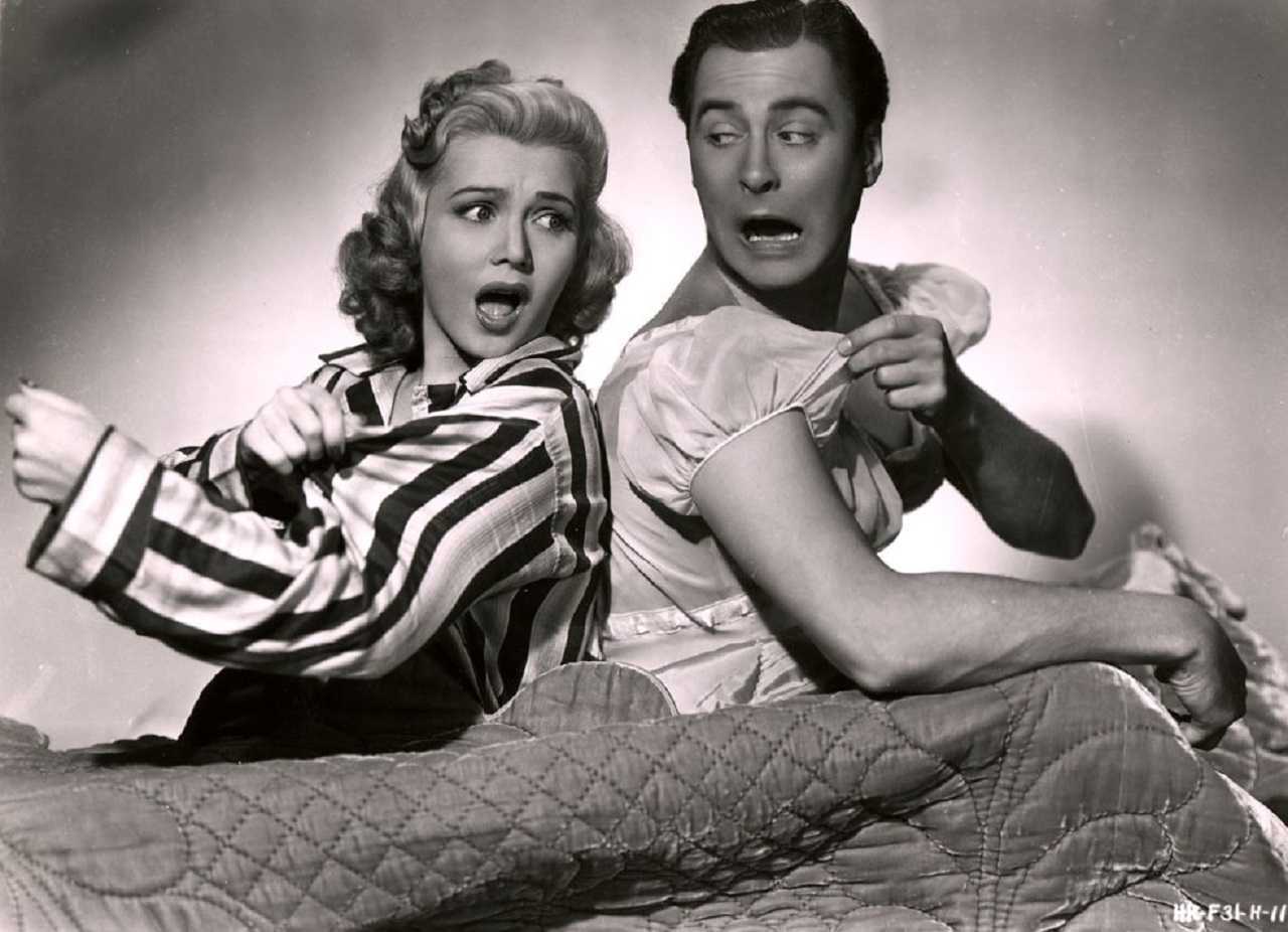 Wife Carole Landis and husband John Hubbard ends up in each other's bodies in Turnabout (1940)