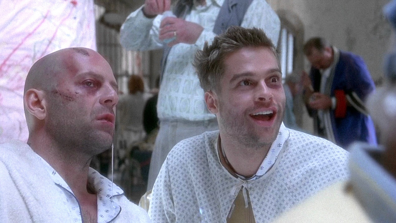 (l to r) fellow psychiatric patients Bruce Willis and Brad Pitt in Twelve Monkeys (1995)