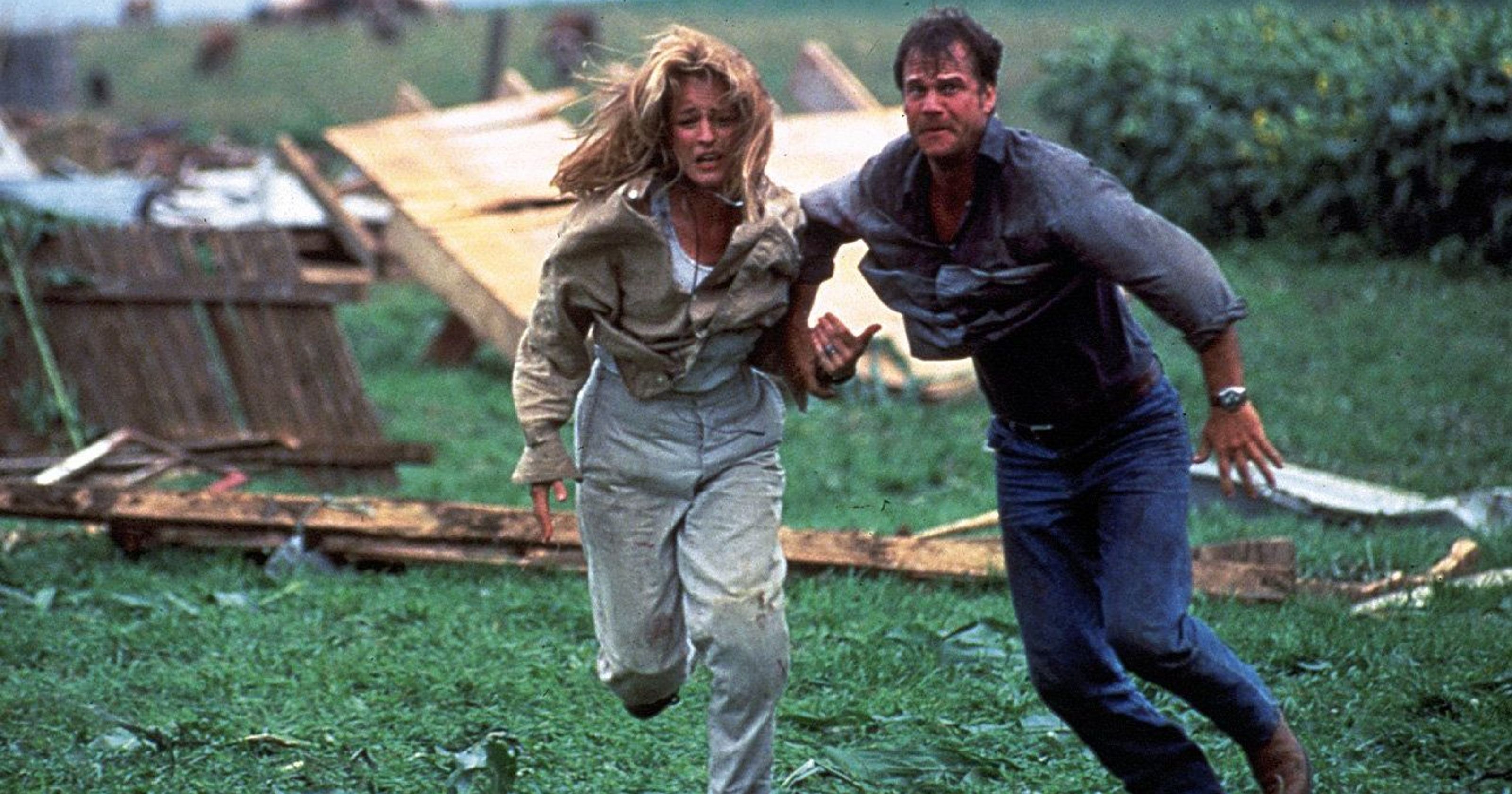 Helen Hunt and Bill Paxton flee in Twister (1996)