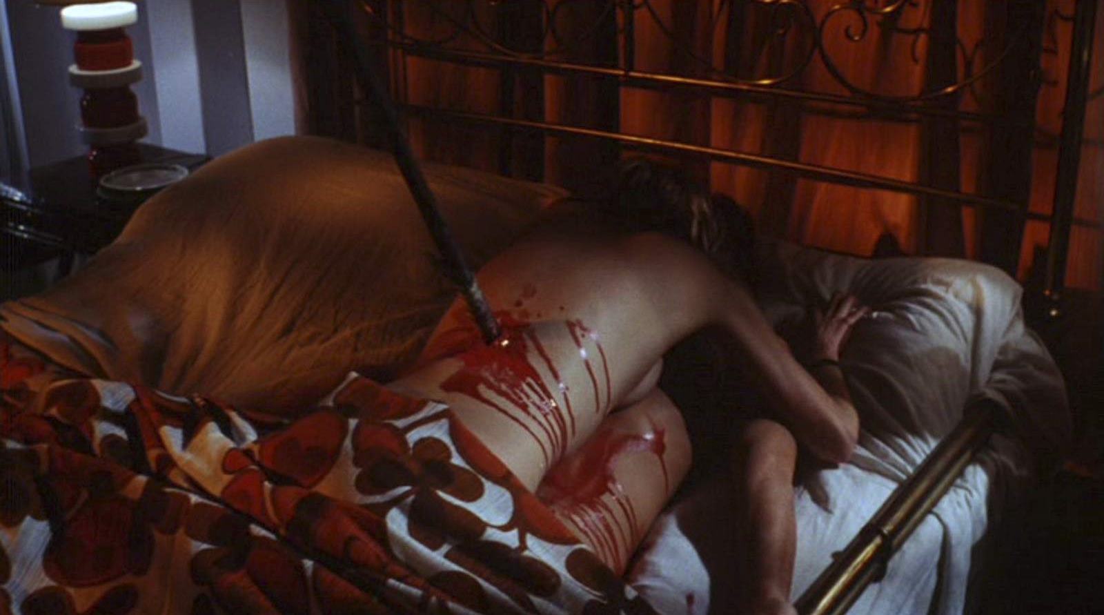Two lovers impaled by a spear in Twitch of the Death Nerve (1971)