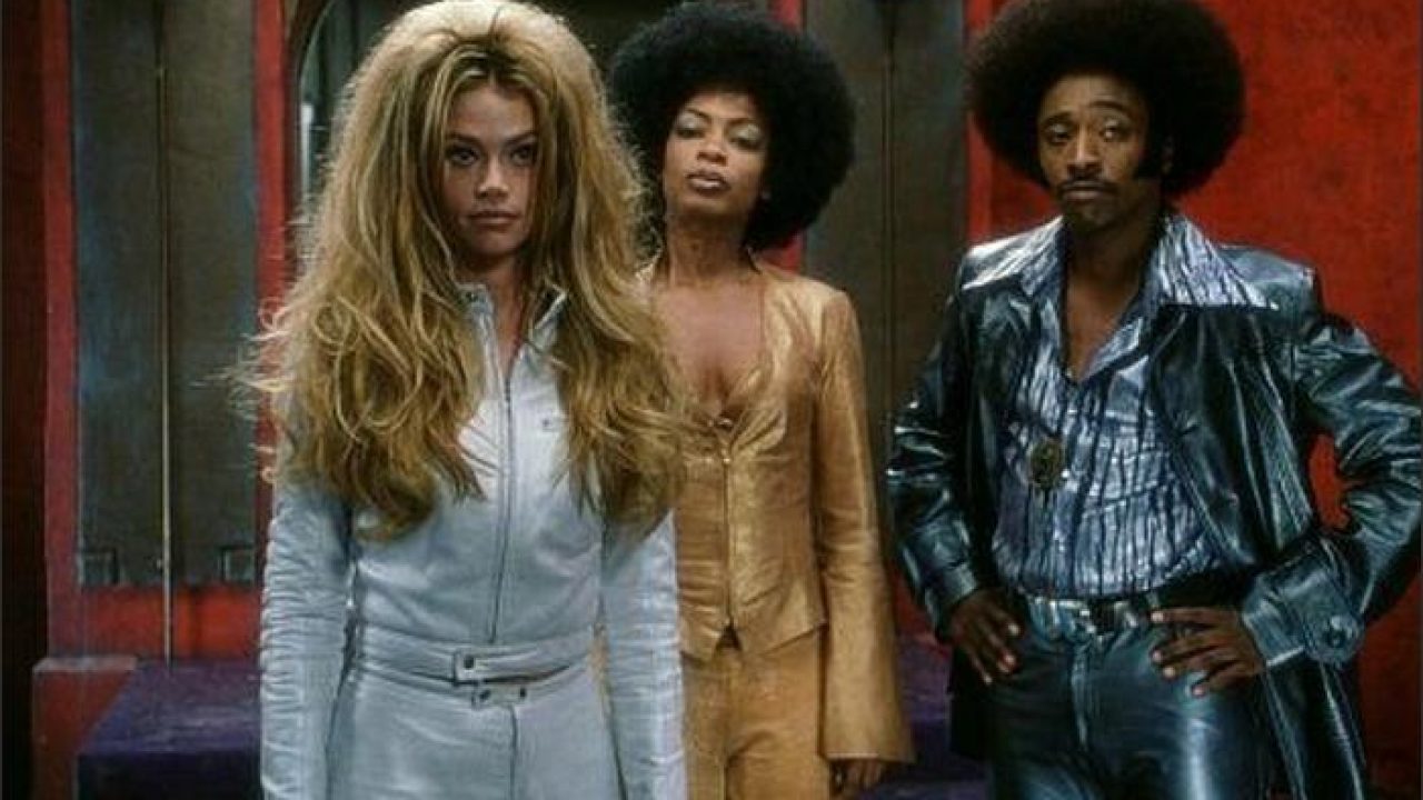 White She Devil (Denise Richards), Sistah Girl (Aunjanue Ellis) and Undercover Brother (Eddie Griffin) in Undercover Brother (2002)