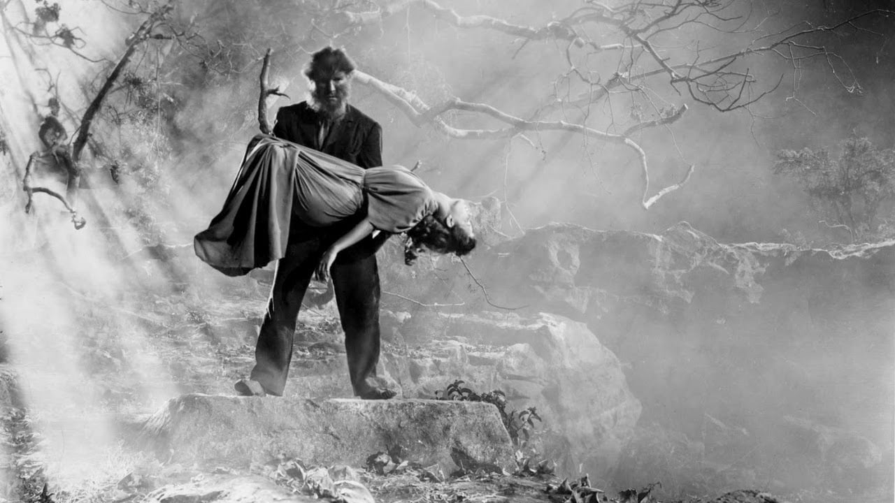 The werewolf carries away Heather Angel in The Undying Monster (1942)