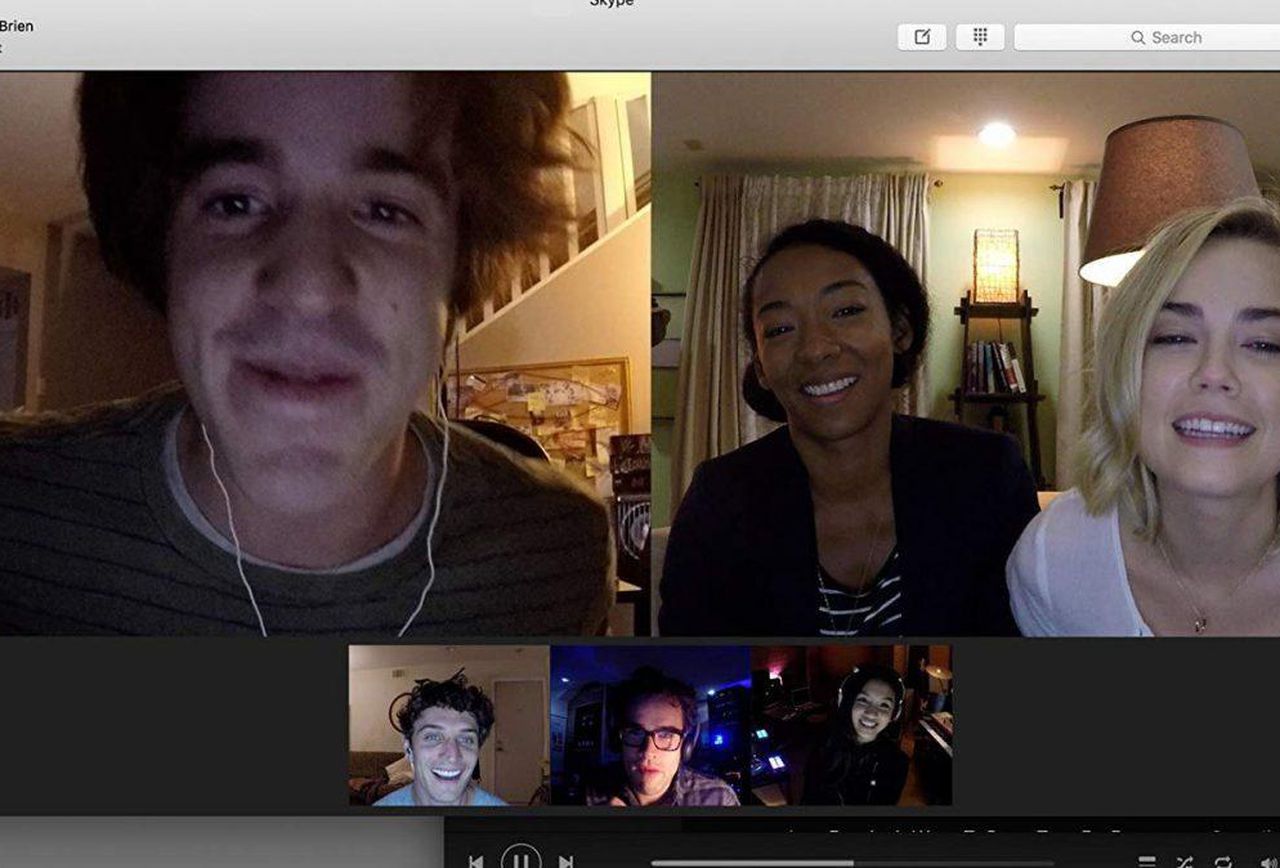 Friends gather for game night - (l to r) (top row) Connor Del Rio, Betty Gabriel, Rebecca Rittenhouse; (bottom row) Colin Woodell, Andrew Lees and Savira Windyani in Unfriended: Dark Web (2018)