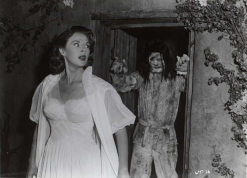 Mala Powers threatened by infected natives in The Unknown Terror (1957)