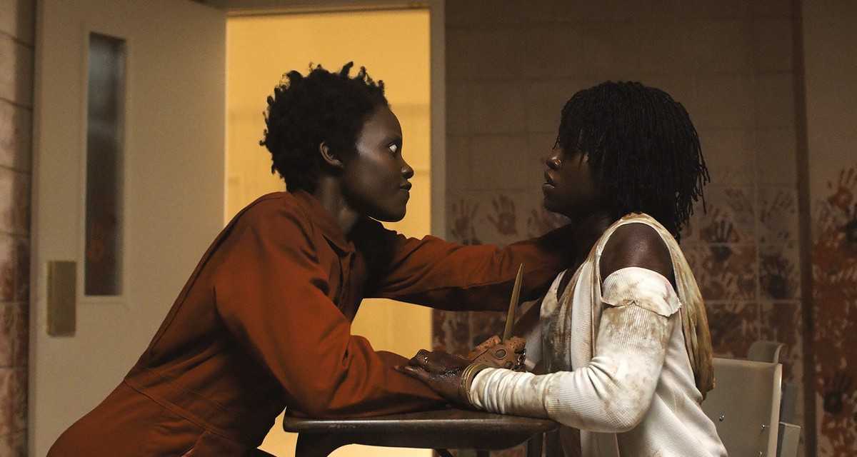 Lupita Nyong'o as (l to r) her Tether known as Red and aboveground self Adelaide Wilson in Us (2019)