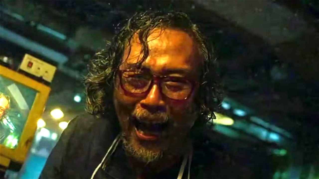 Budi Ross as the mad scientist in The Subject episode of V/H/S/94 (2021)