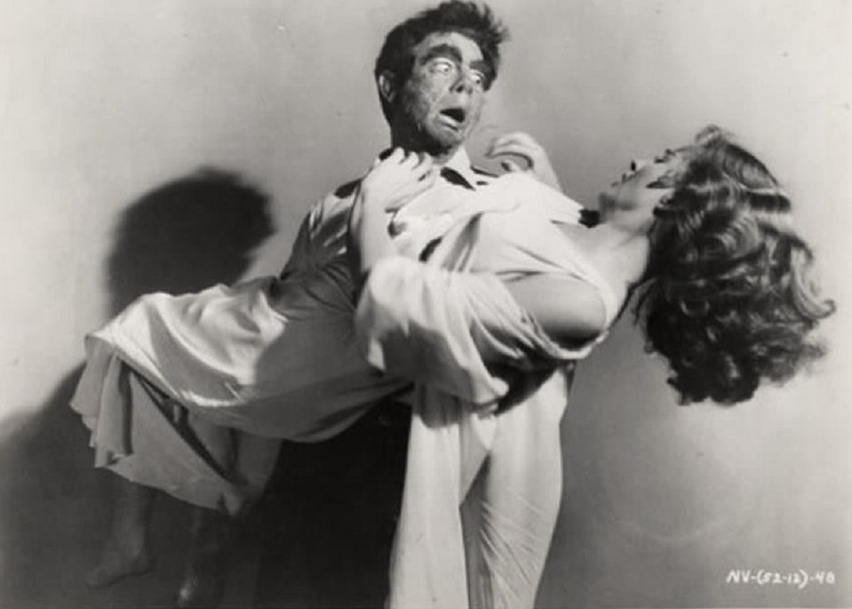 Vampire monster Dr Paul Beecher (John Beel) carries away Coleen Gray in The Vampire (1957)