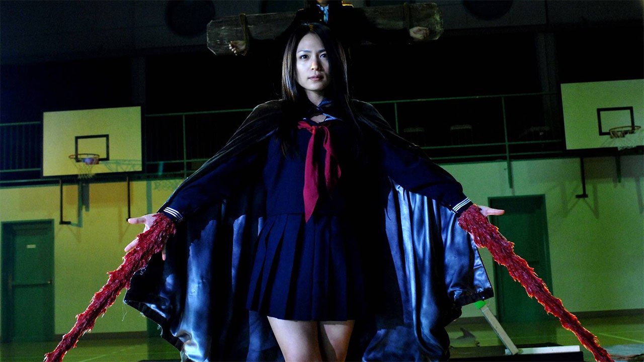 Vampire Girl Monami (Yukie Kamamura) forms swords of solidified blood from her wrists in Vampire Girl vs Frankenstein Girl (2009)