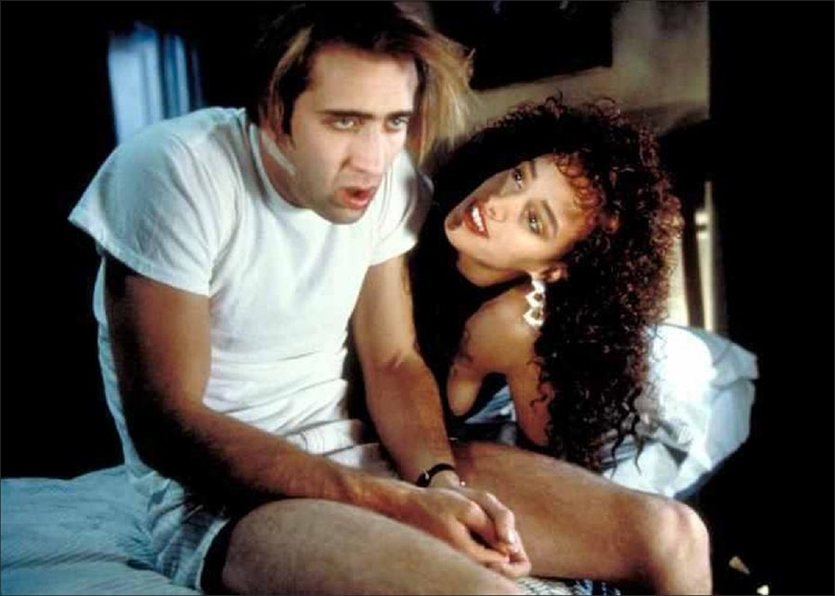 Nicolas Cage and Jennifer Beals in Vampire's Kiss (1988)