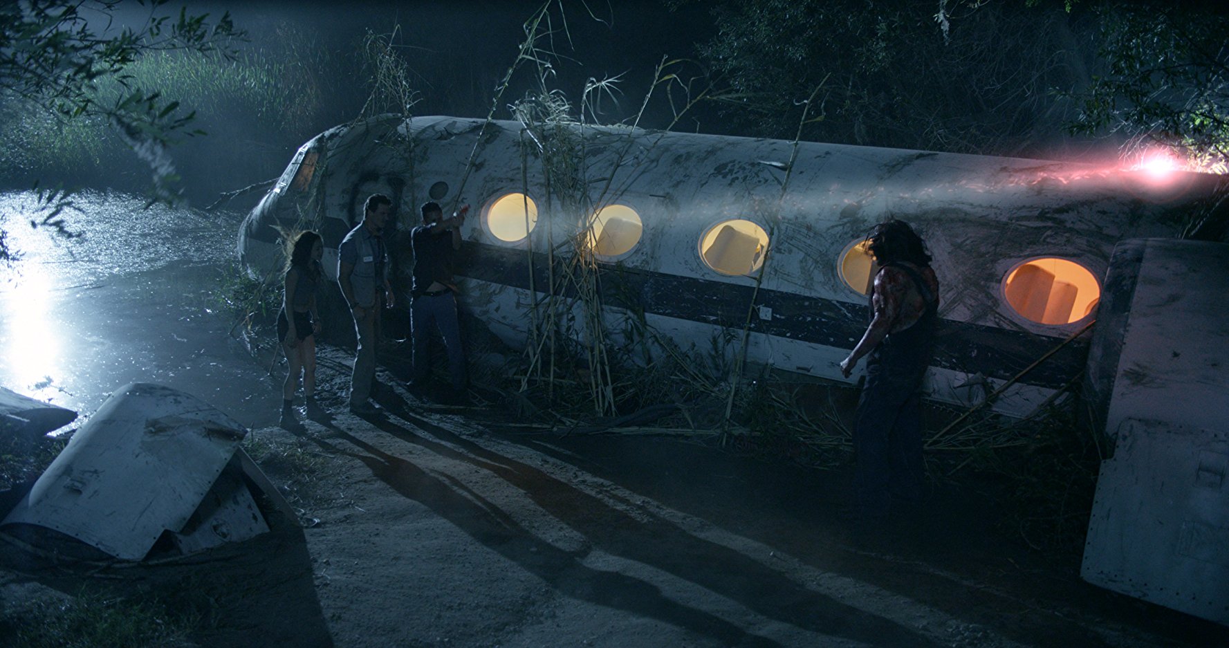 Kane Hodder prepares the slaughter survivors from a crashed plane in Victor Crowley (2017)