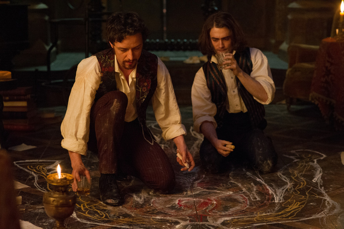 Victor Frankenstein (James McAvoy) and Igor (Daniel Radcliffe) at work in Victor Frankenstein (2015)