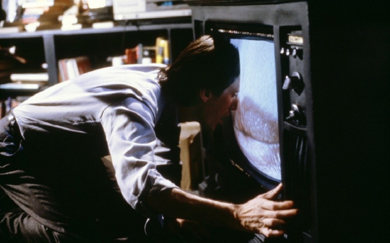 James Wood has his head swallowed by a tv in Videodrome (1983)