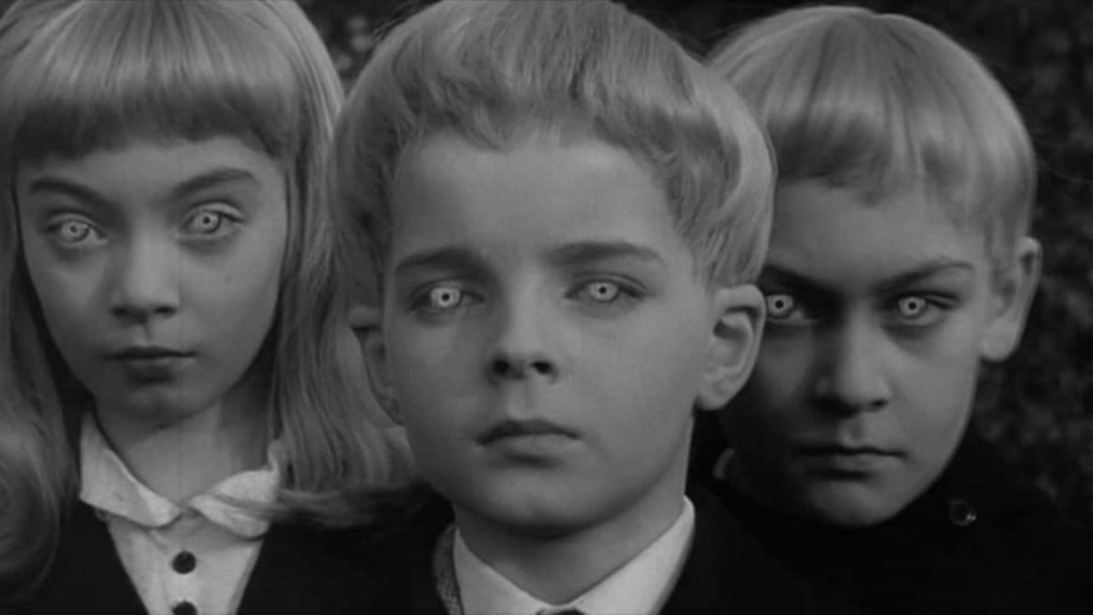 Coldly superior alien children led by Martin Stephens (c) in The children Village of the Damned (1960)