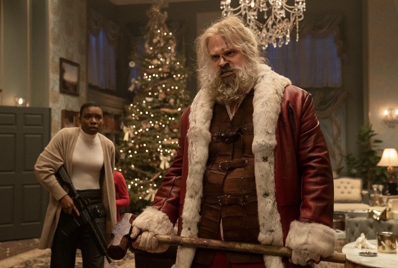 David Harbour as Santa Claus and Alexis Louder in Violent Night (2022)