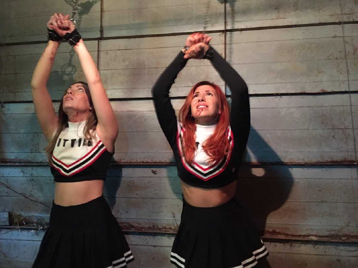 Kelsey Pribilski and Elizabeth Maxwell in Virgin Cheerleaders in Chains (2018)