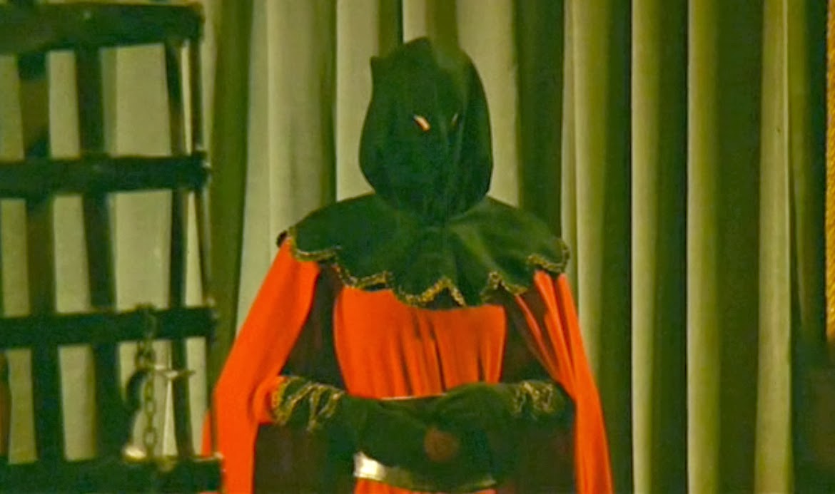 The Executioner prowls the halls in The Virgin of Nuremberg (1963)