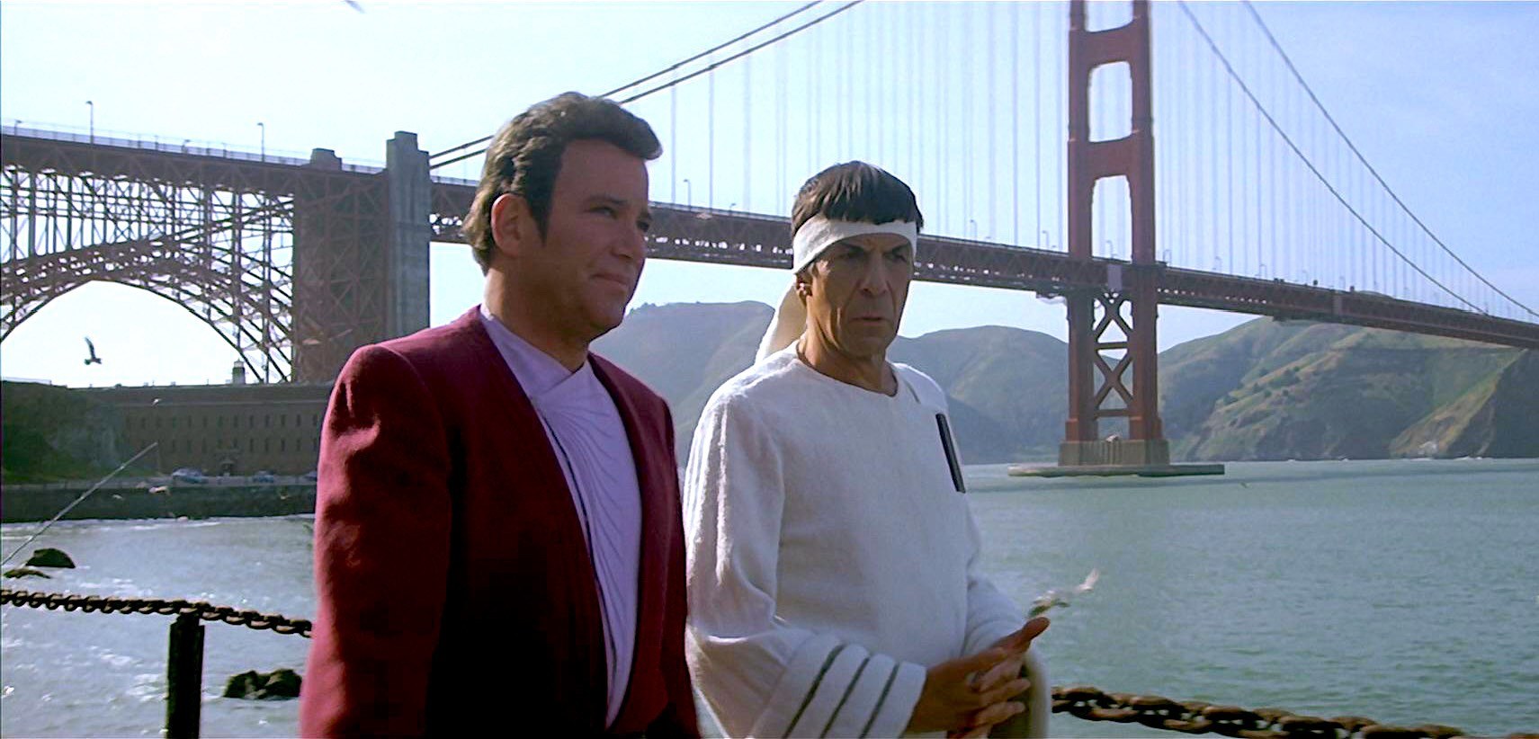 Captain Kirk (William Shatner) and Mr Spock (Leonard Nimoy) against the backdrop of the Golden Gate Bridge in The Voyage Home: Star Trek IV (1986)