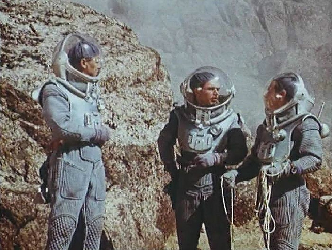 The astronauts explore Venus in Voyage to the Prehistoric Planet (1965)