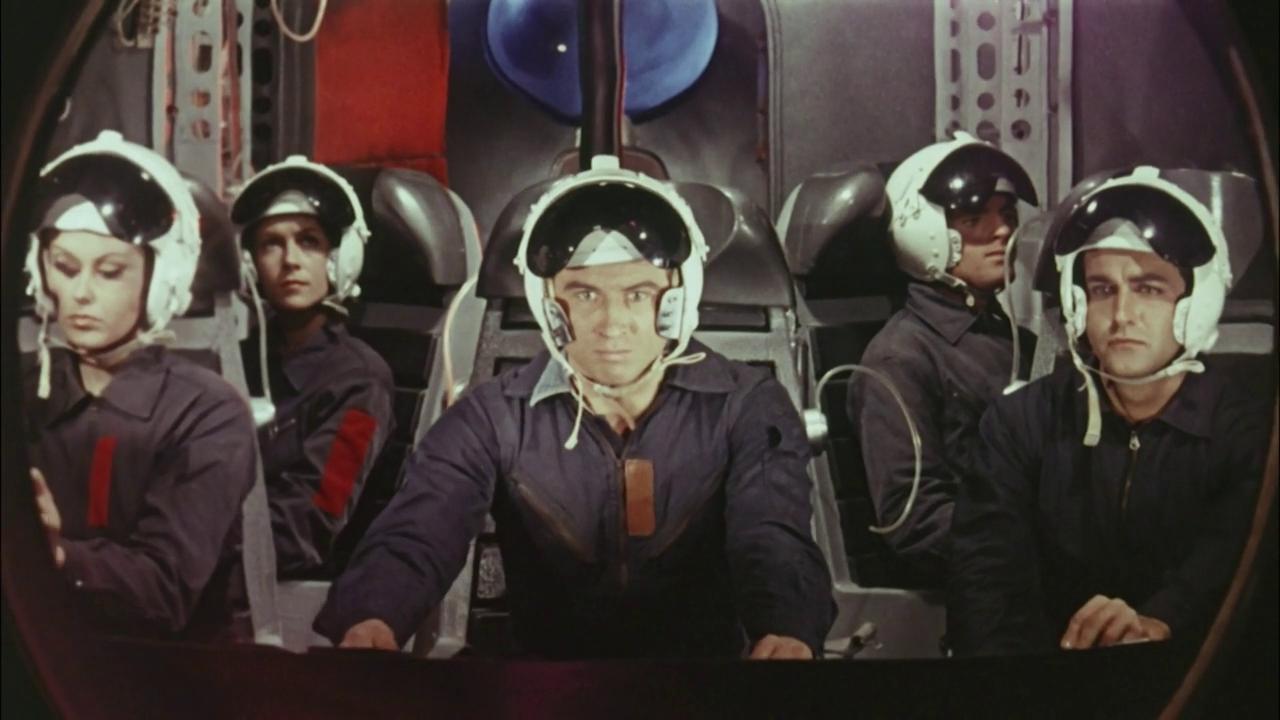 (l to r) Ombretta Colli, Giacomo Rossi Stuart and Pietro Martellanza lead the expedition to the asteroid in War Between the Planets (1966)