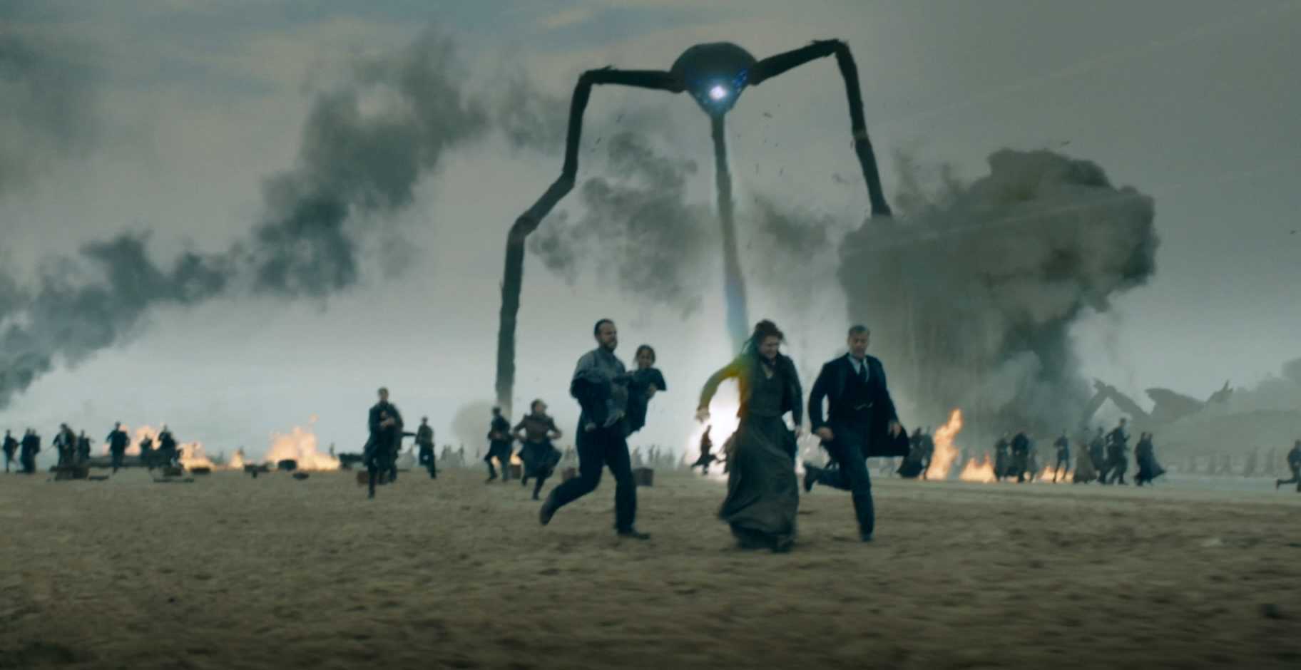 (l to r) Rafe Spall, Eleanor Tomlinson and Rupert Graves flee from a Martian war machine in The War of the Worlds (2019)