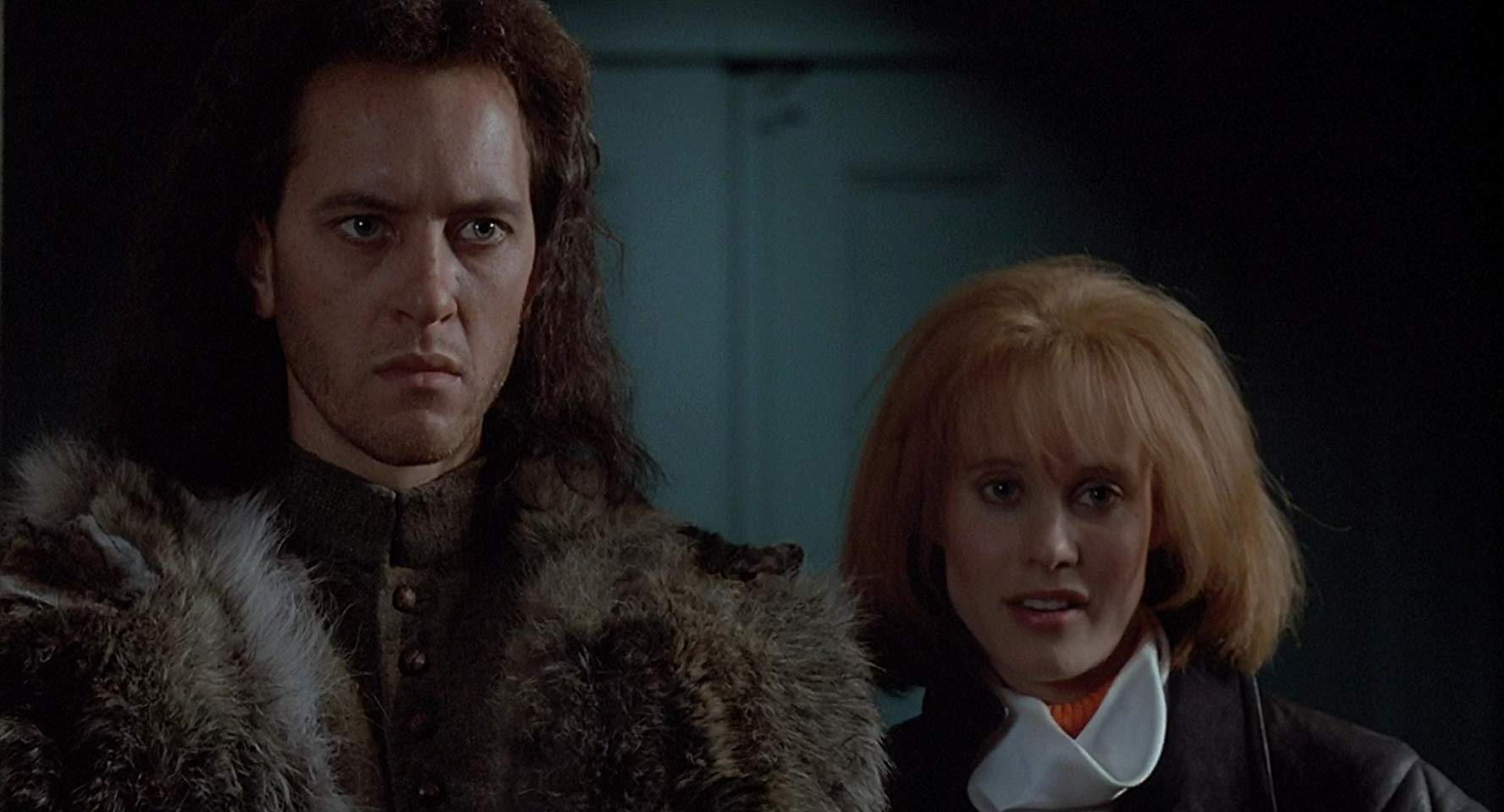 Time-travelling witchfinder Giles Redferne (Richard E. Grant) and modern girl Kassandra (Lori Singer) in Warlock (1989)