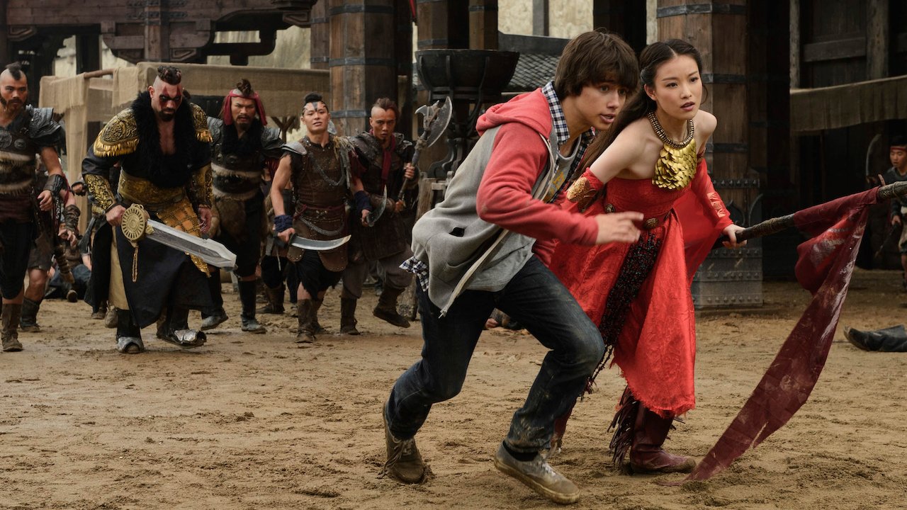 Modern videogamer Uriah Shelton and pricness Ni Ni on the run in The Warrior's Gate (2016)