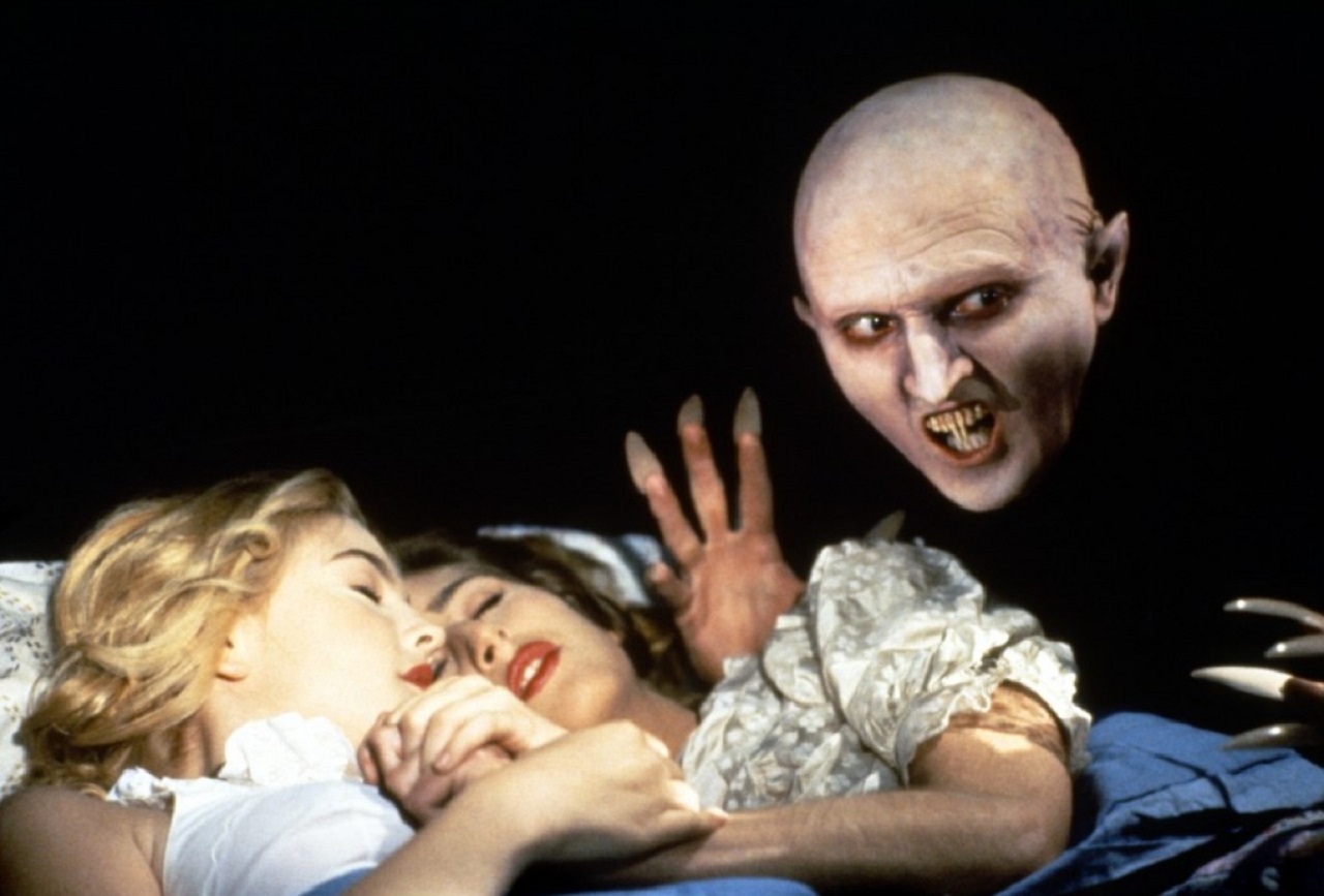 Steven Painter and Drew Barrymore in the Nosferatu pastiche in Waxwork II Lost in Time (1992) 2