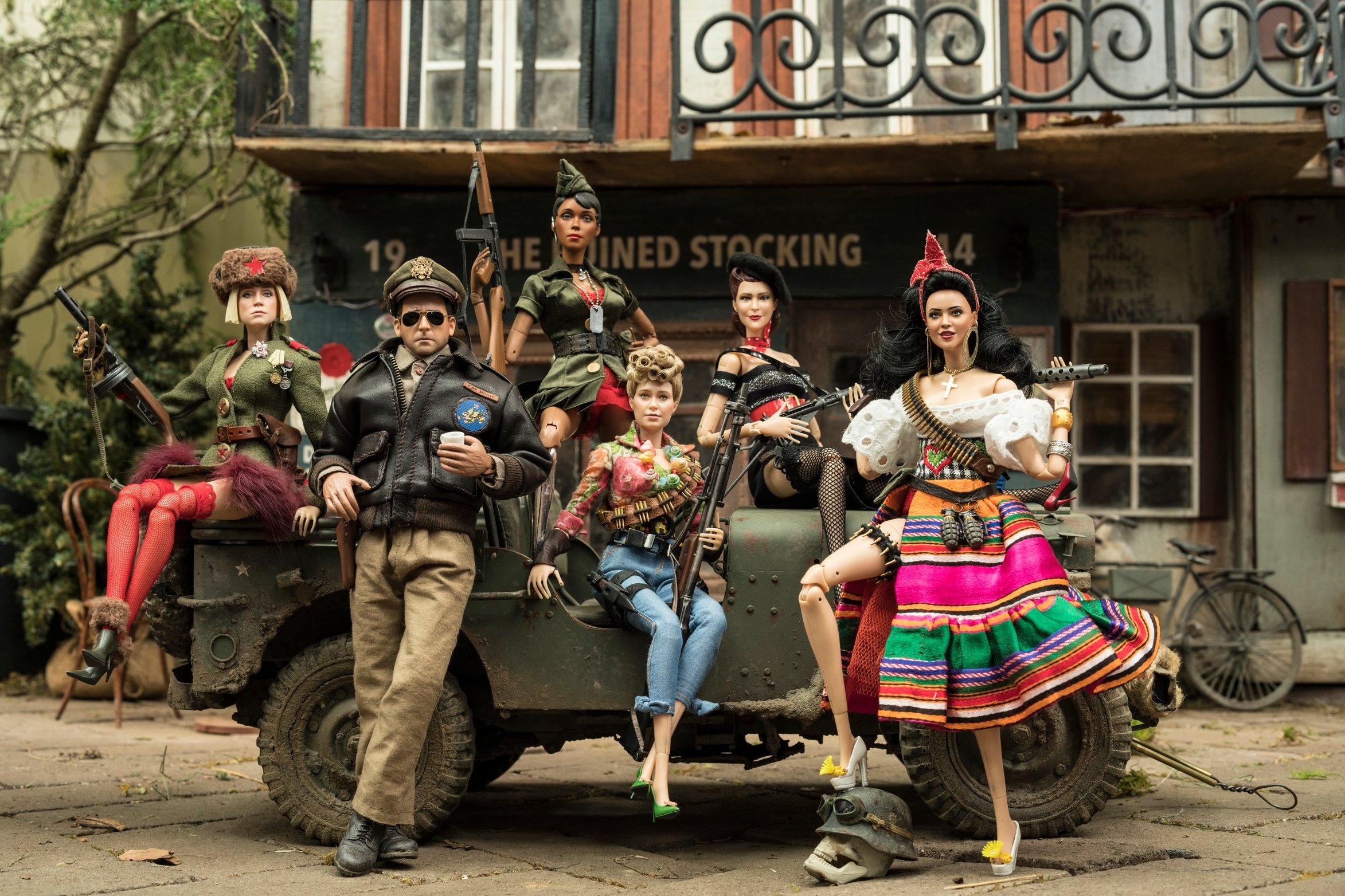 The village of Marwen with Cap'n Hogie surrounded by his army of women in Welcome to Marwen (2018)