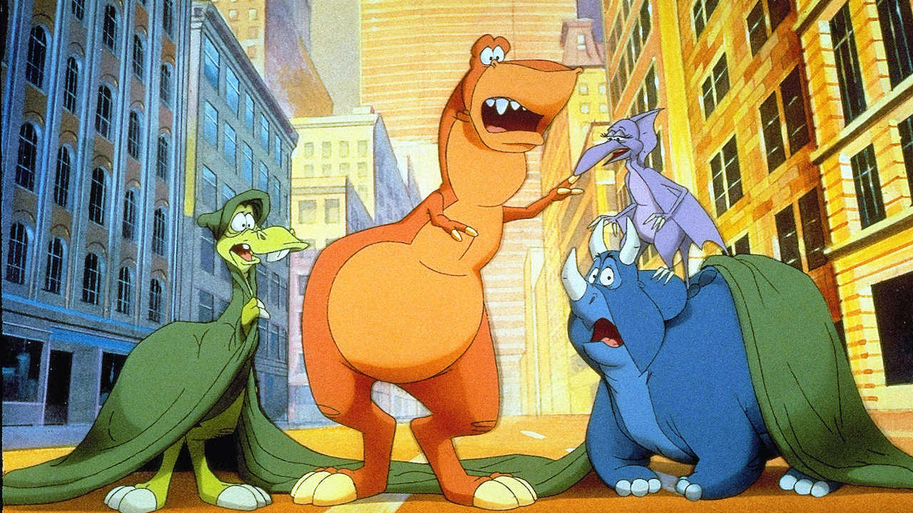 The dinosaurs - (l to r) Dweeb The Parasaurolophus (voiced by Charles Fleischer), Rex (voiced by John Goodman), Elsa The Pteranodon (voiced by Felicity Kendal) and Woog The Triceratops (voiced by Rene Le Vant) in We're Back! A Dinosaur's Story (1993)