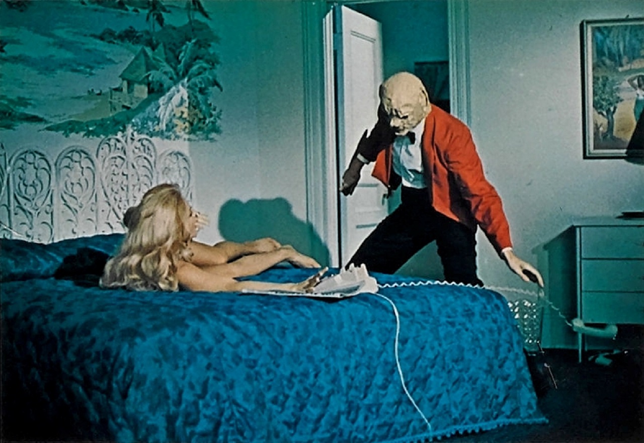 The masked killer attacks Tiffany Bolling in Wicked, Wicked (1973)