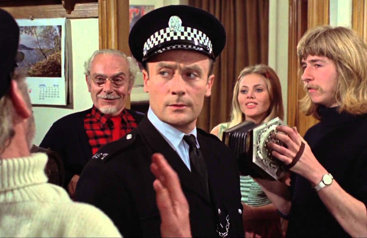 Police sergeant Edward Woodward investigates a disappearance on Summerisle in The Wicker Man (1973)