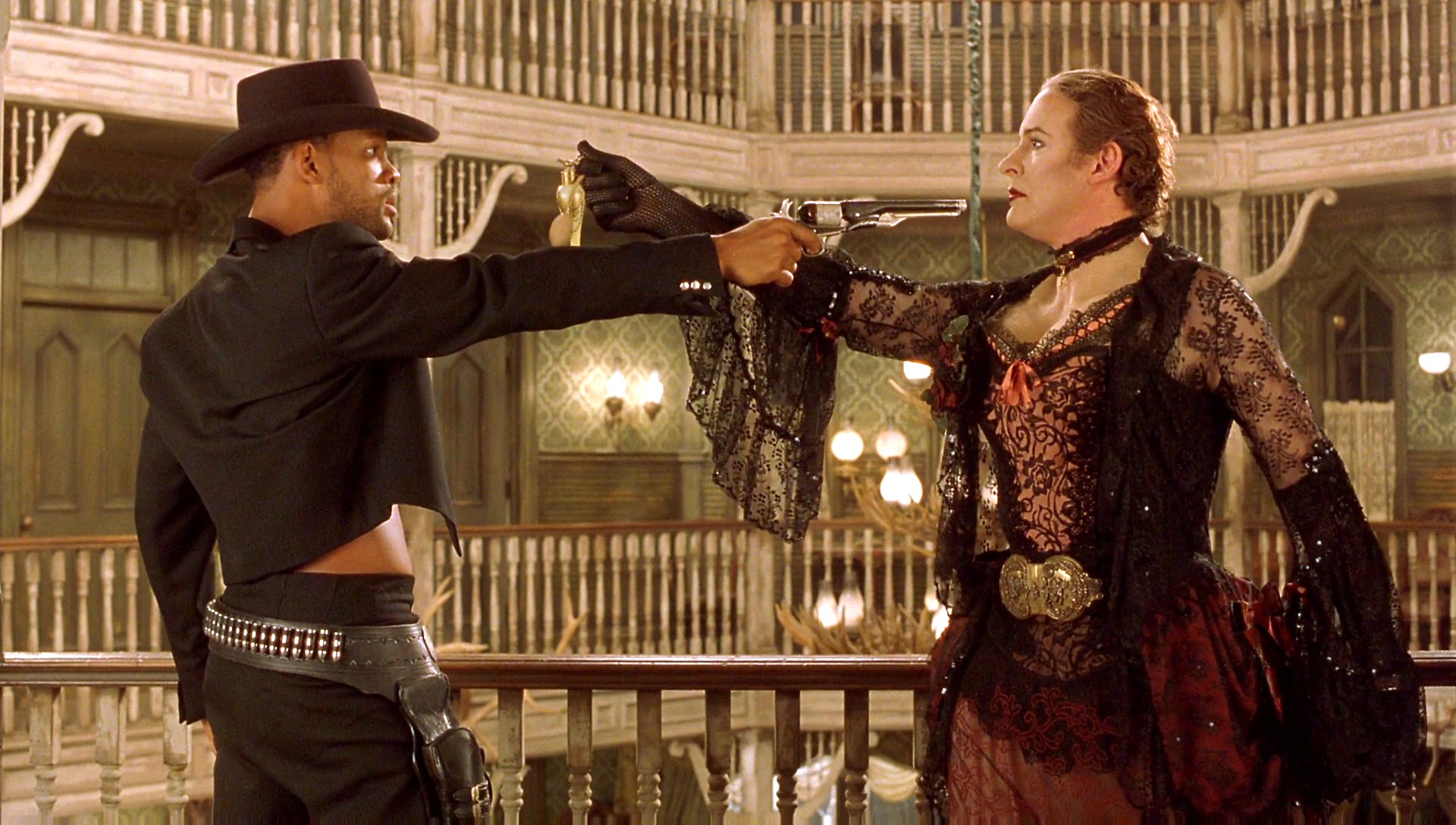 Will Smith and a drag-outfitted Kevin Kline in a Mexican standoff in Wild Wild West (1999)