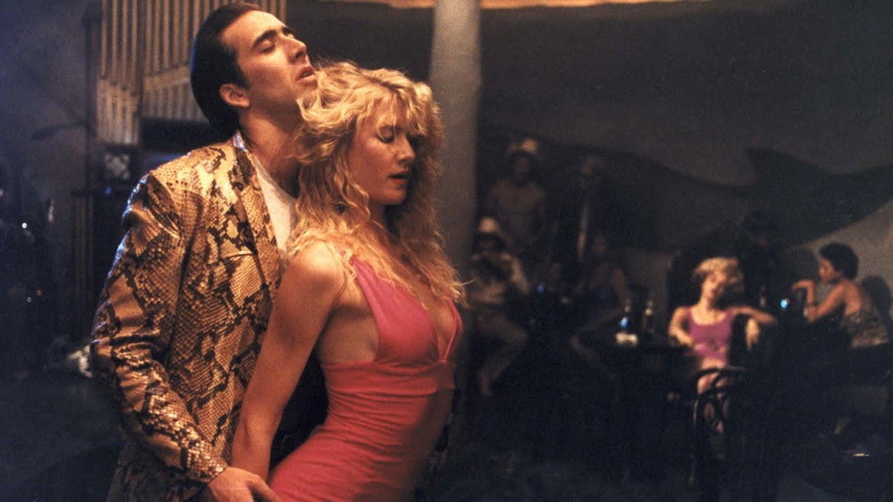 Sailor Ripley (Nicolas Cage) and Lula Fortune (Laura Dern) dance in Wild at Heart (1990)