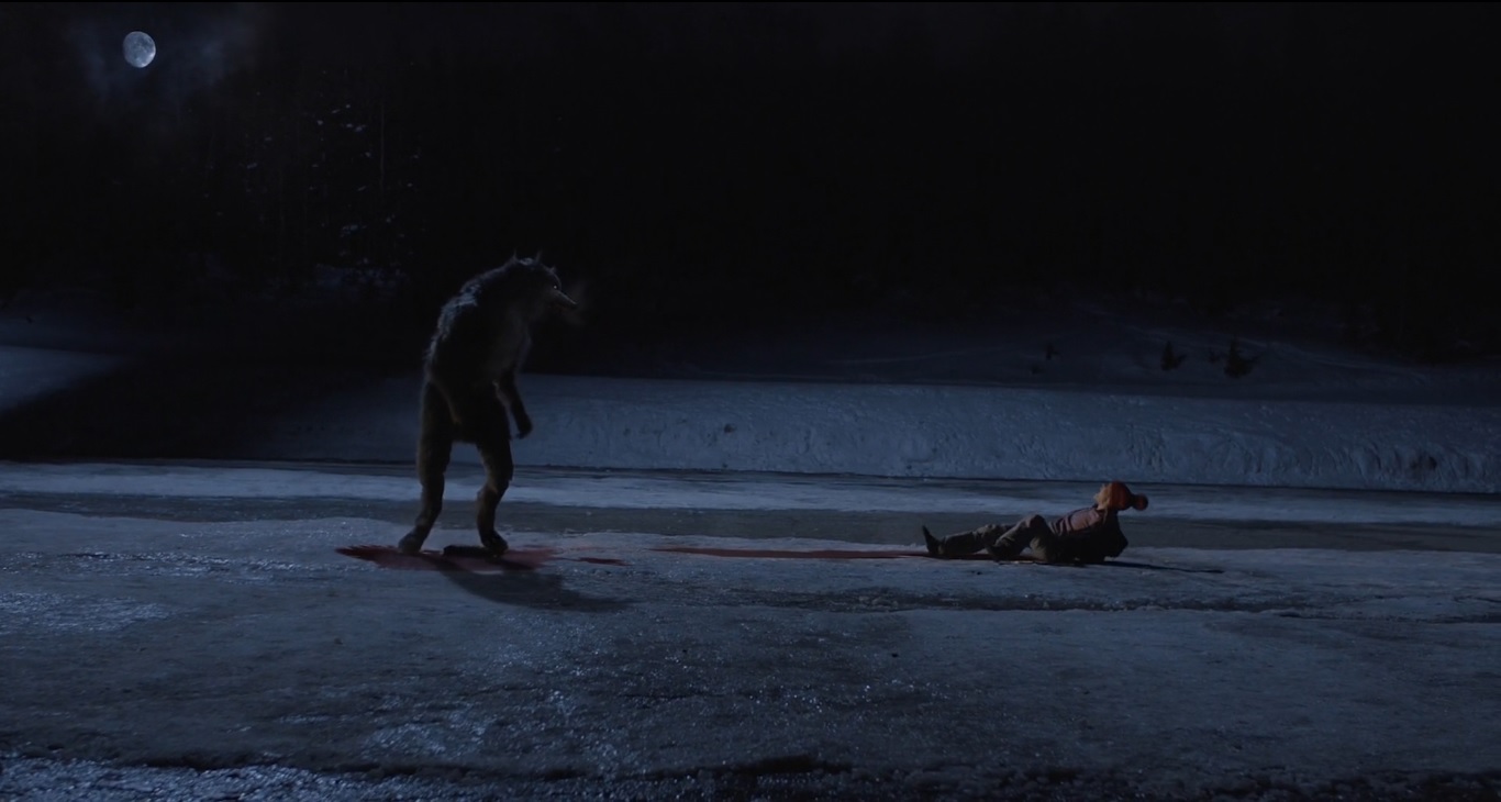 The wolf attacks Hannah Elder in The Wolf of Snow Hollow (2020) 1