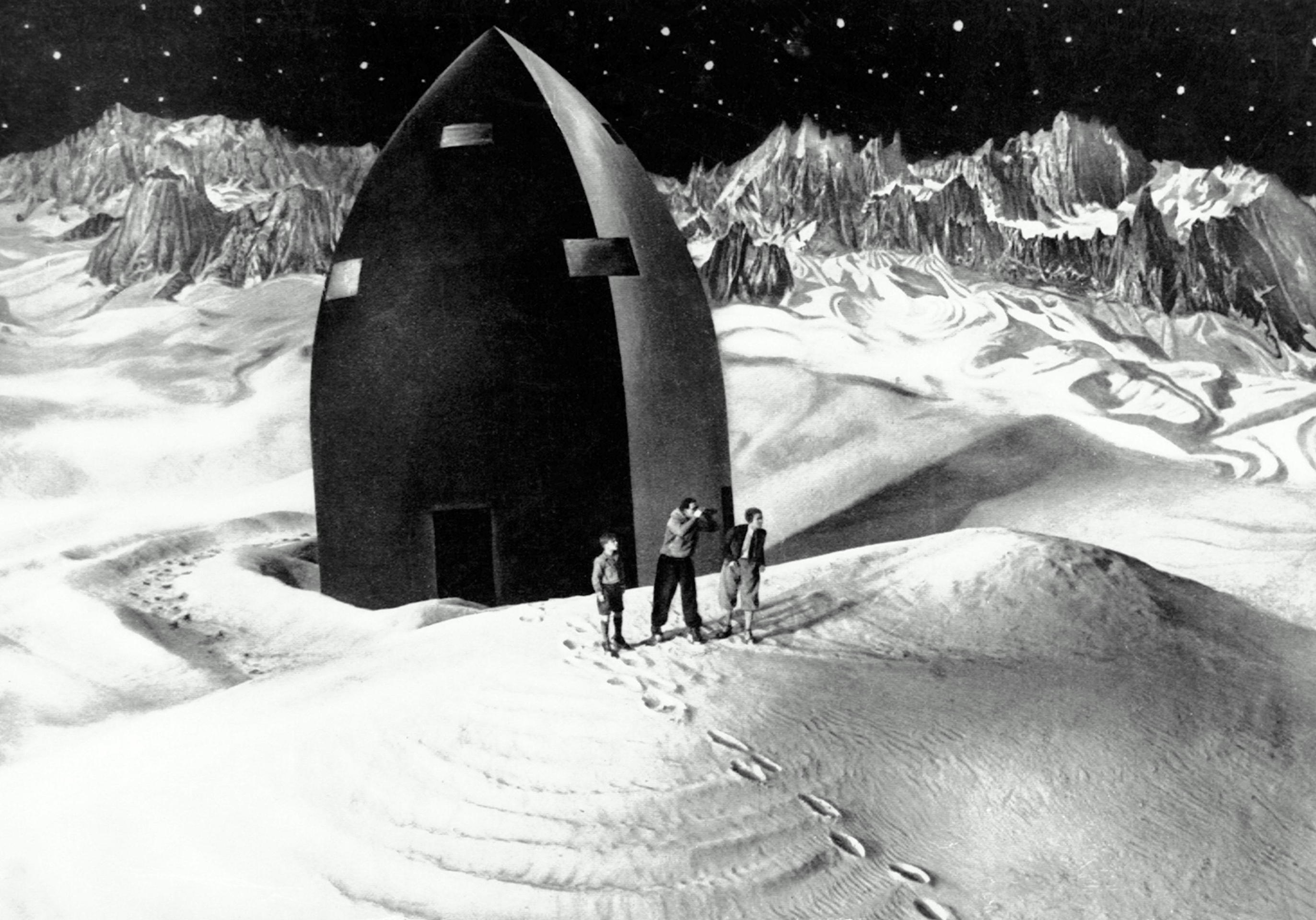 The rocket landed on The Moon as the explorers - (l to r) Gustl Gstettenbaur, Willy Fritsch and Gerda Marcus - set out in Woman in the Moon (1929)