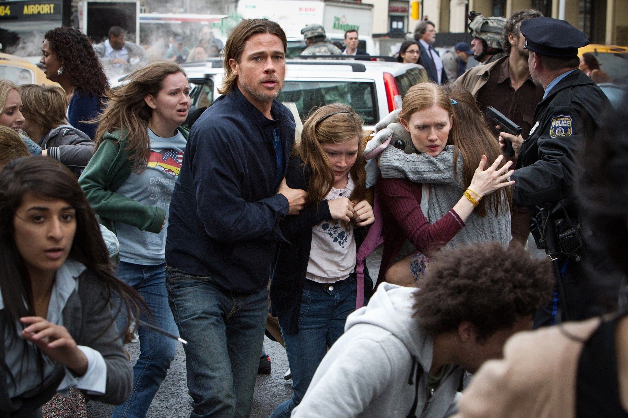 Brad Pitt and family attempt to escape the zombie onslaught in the streets of Philadelphia in World War Z (2013