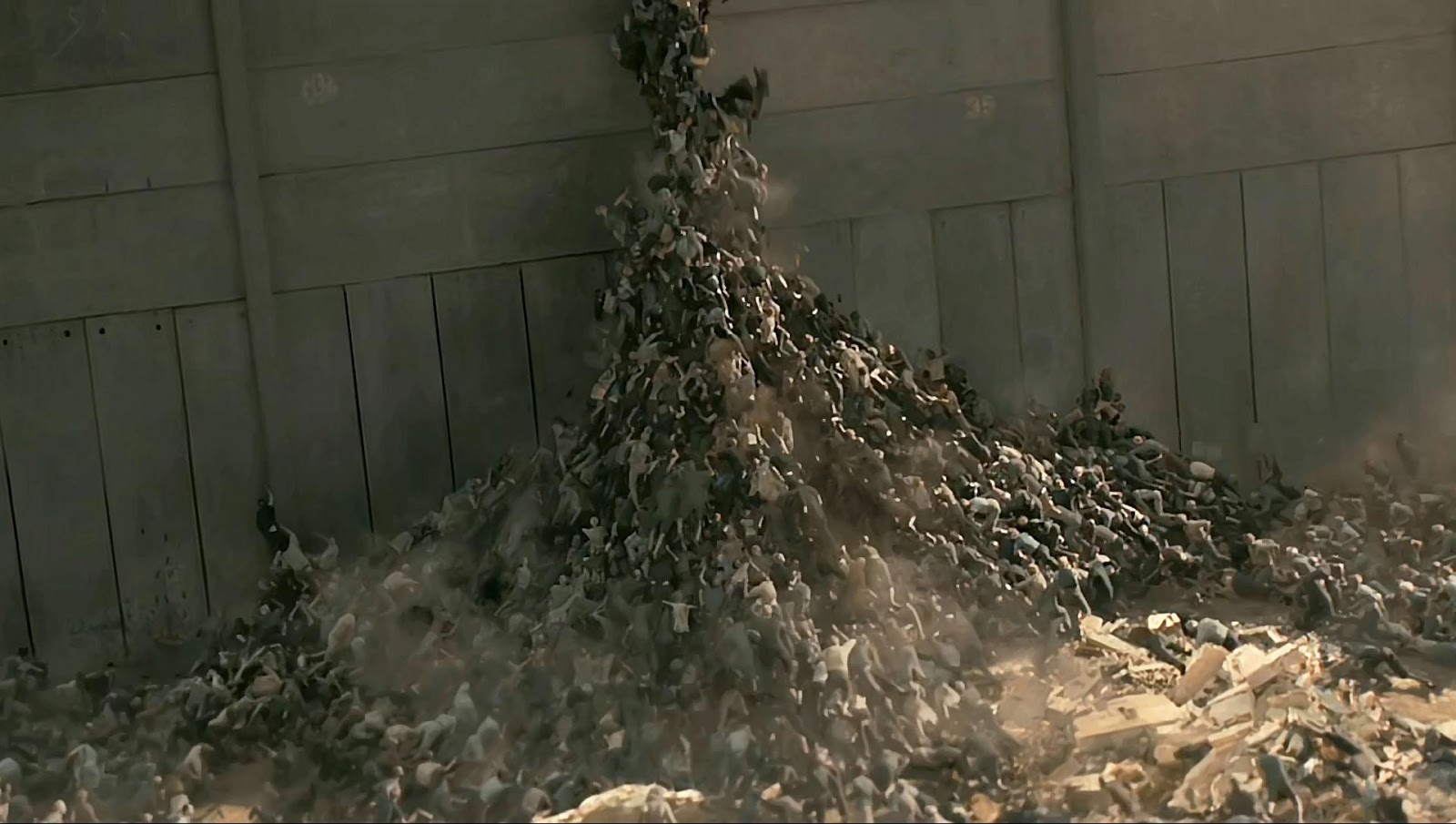 Zombies scales the walls of Jerusalem in World War Z (2013