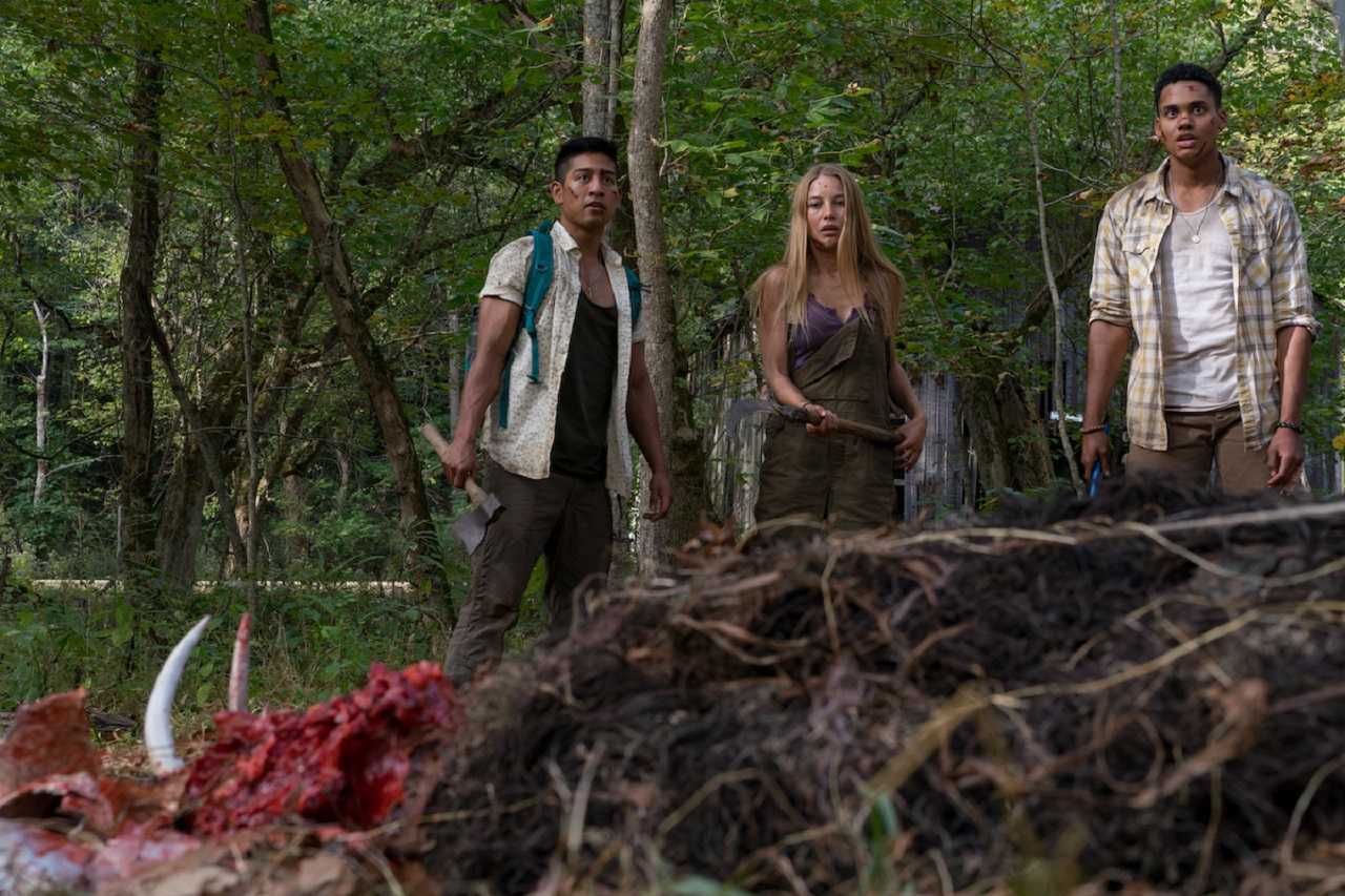 (l to r) Adrian Favela, Charlotte Vega and Adain Bradley in Wrong Turn (2021)