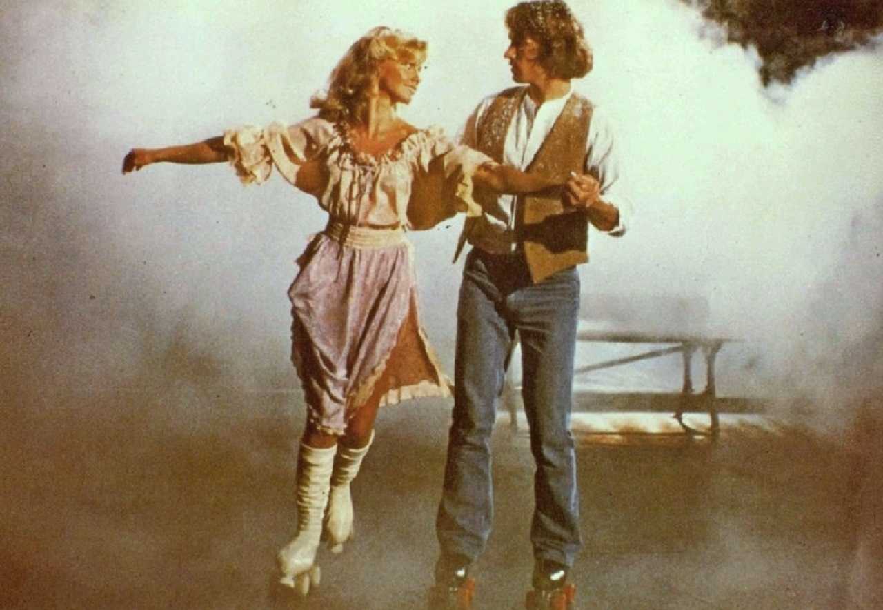 Olivia Newton-John and Michael Beck go rollerskating in Xanadu (1980)