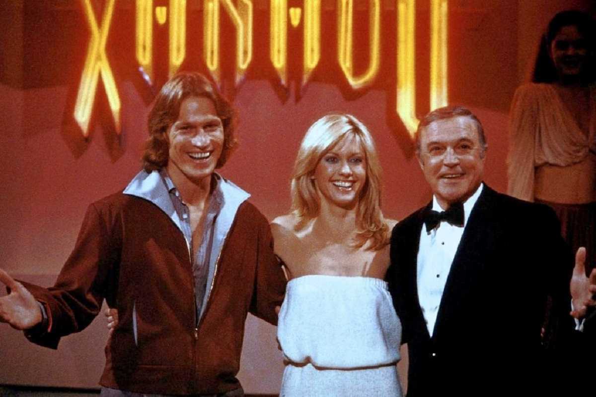 (l to r) Michael Beck, Olivia Newton-John and Gene Kelly at the opening of the Xanadu in Xanadu (1980)