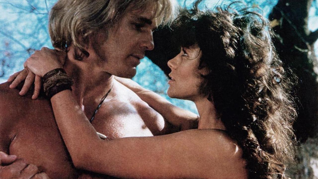 Yor (Reb Brown) and Ka=Laa (Corinne Clery) in Yor, The Hunter from the Future (1983)